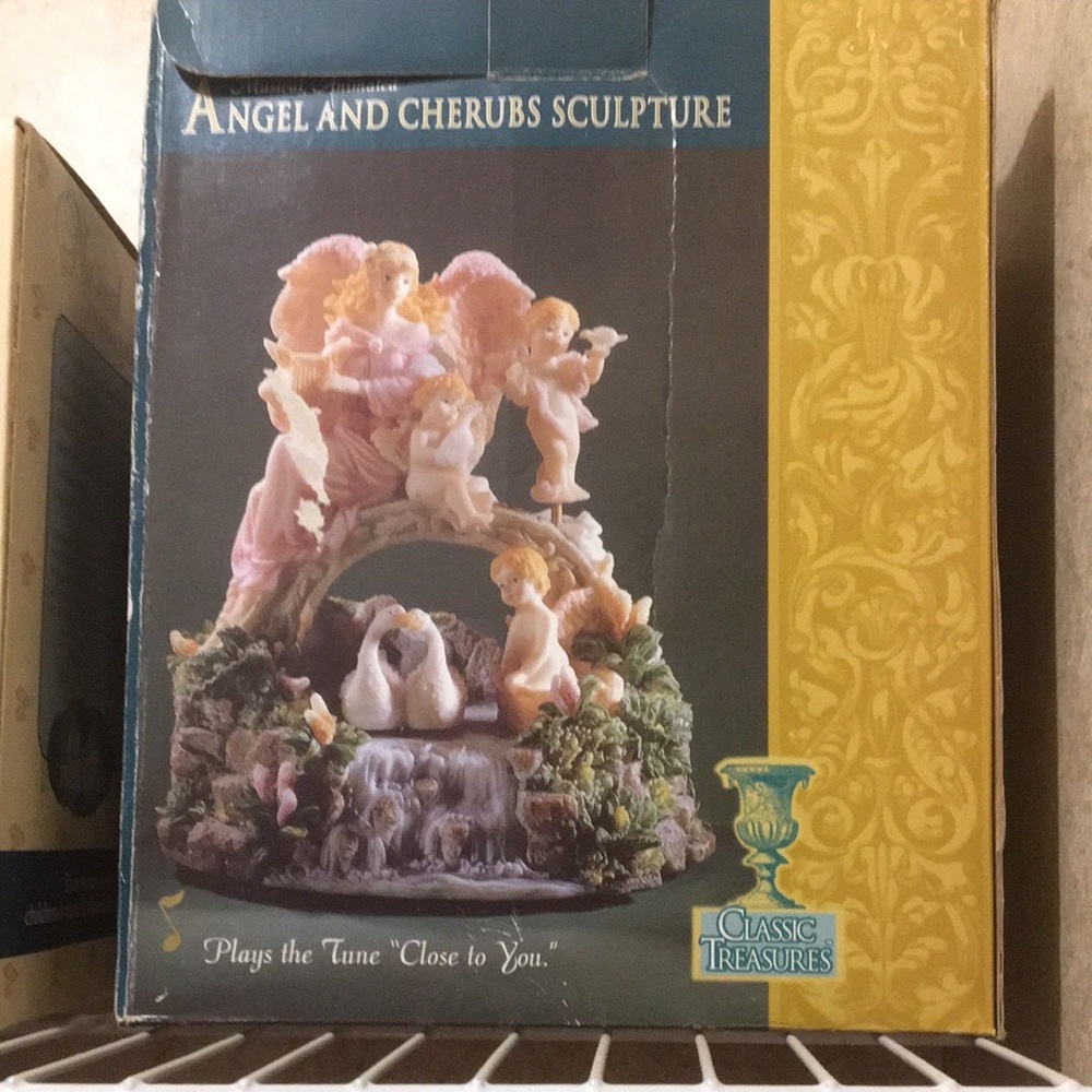 Angels and cherubs statue